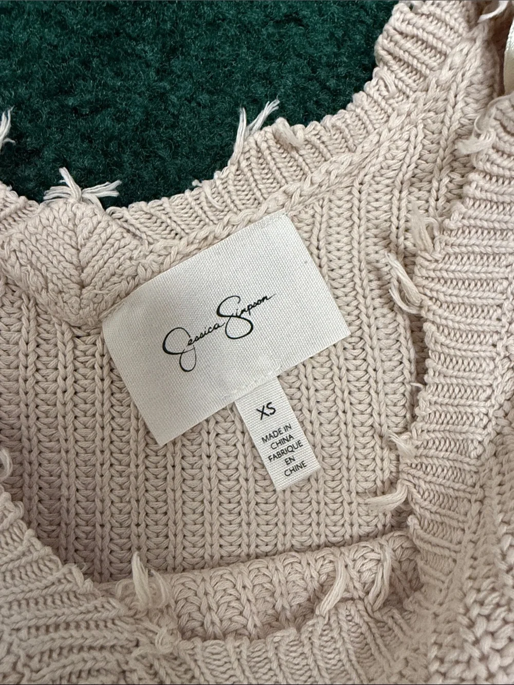 Just Polly distressed purple sweater,distressed Jessica Simpson beige sweater.